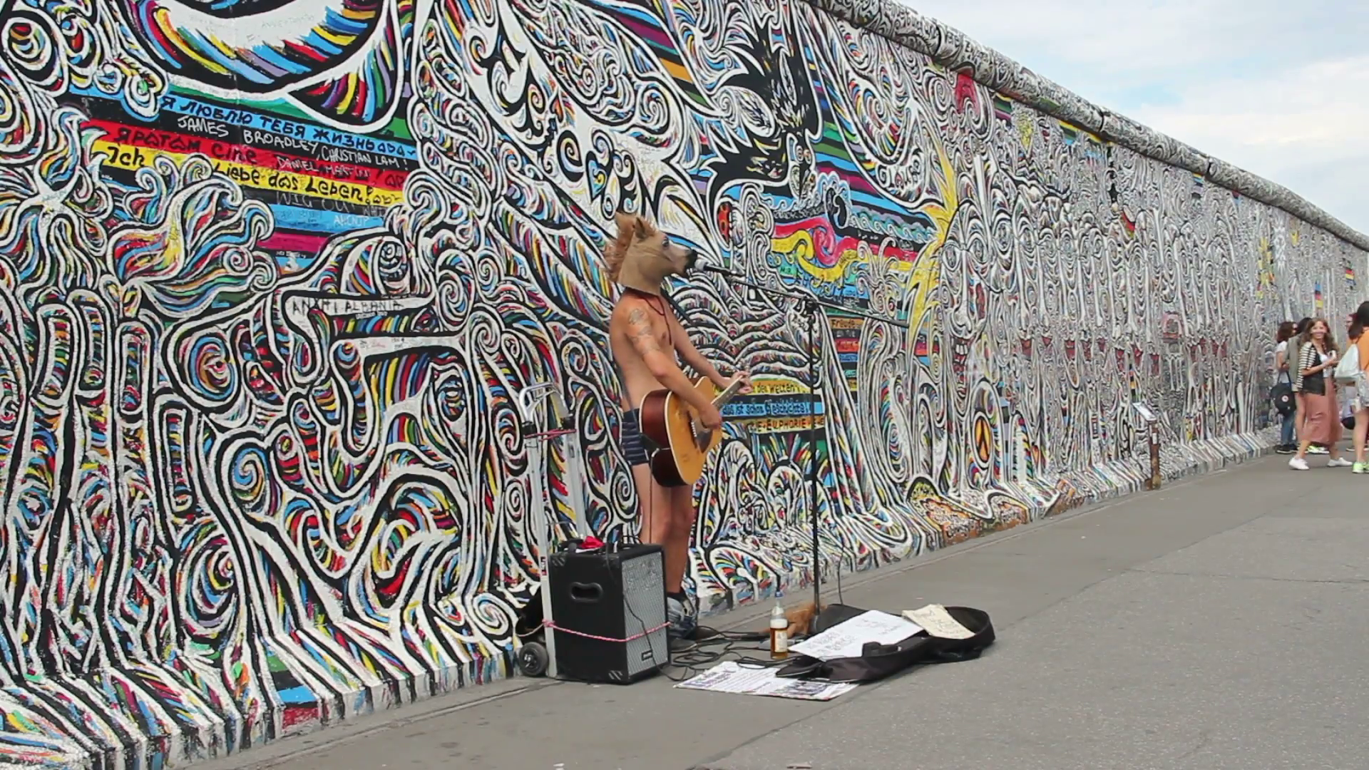 Man With Horse Head Is Playing Guitar At The Berlin Wall, Germany Stock Video Footage   Videoblocks - Berlin Wall, Transparent background PNG HD thumbnail