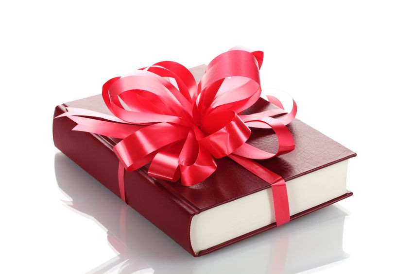 A gift book wrapped in ribbon