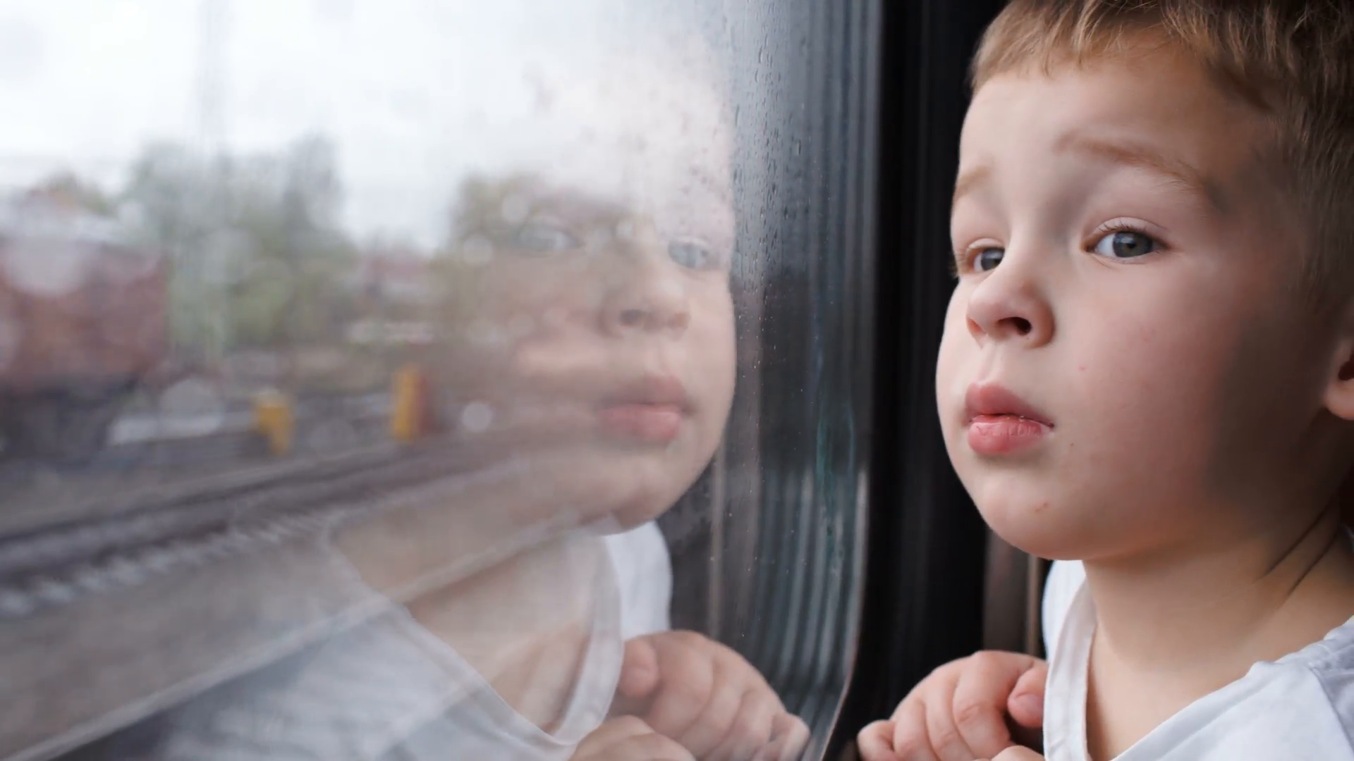 Close Up Shot Of A Little Curious Boy Looking Out Of The Window In Train. Itu0027S Raining Outside, Child Reflecting In The Glass Stock Video Footage   Hdpng.com  - Boy Looking Out Window, Transparent background PNG HD thumbnail