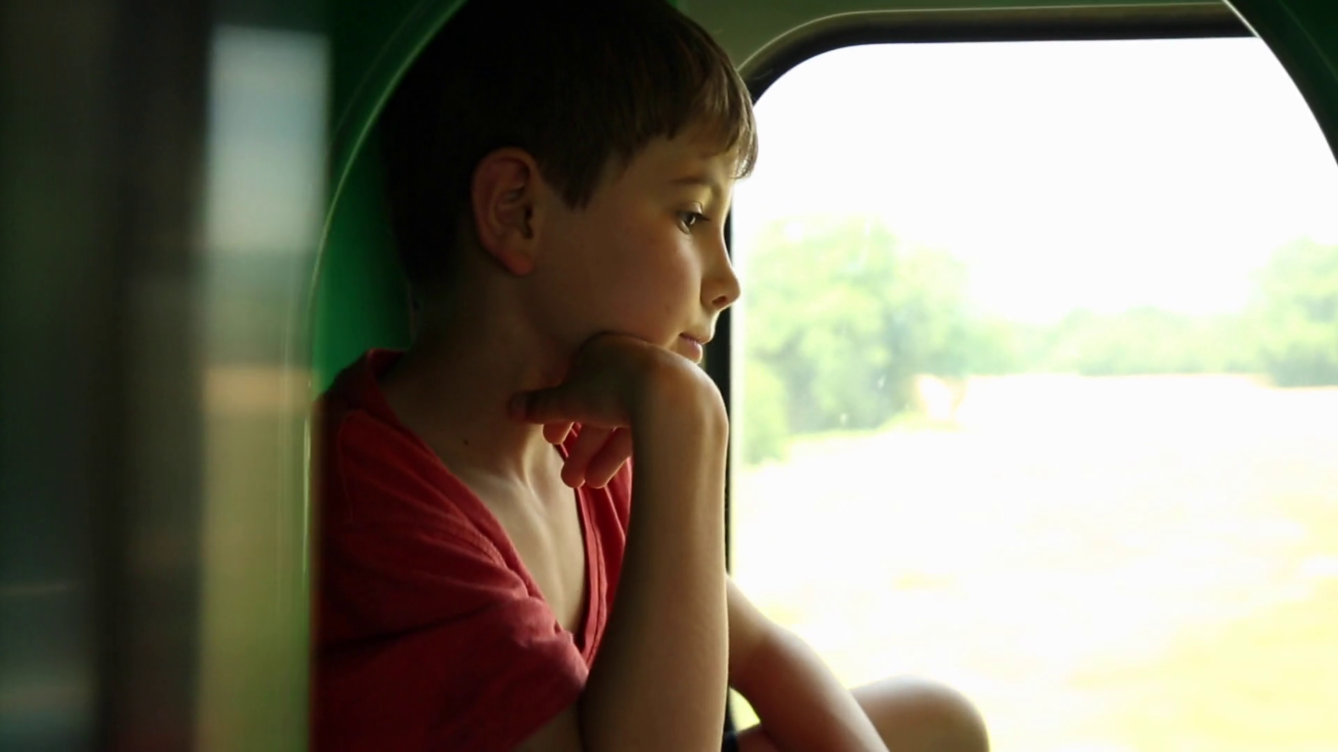 Contemplative Child Daydreaming While Looking Out Train Window. Kid Looking Out Train Window Thinking With A Thoughtful Look On Face. - Boy Looking Out Window, Transparent background PNG HD thumbnail