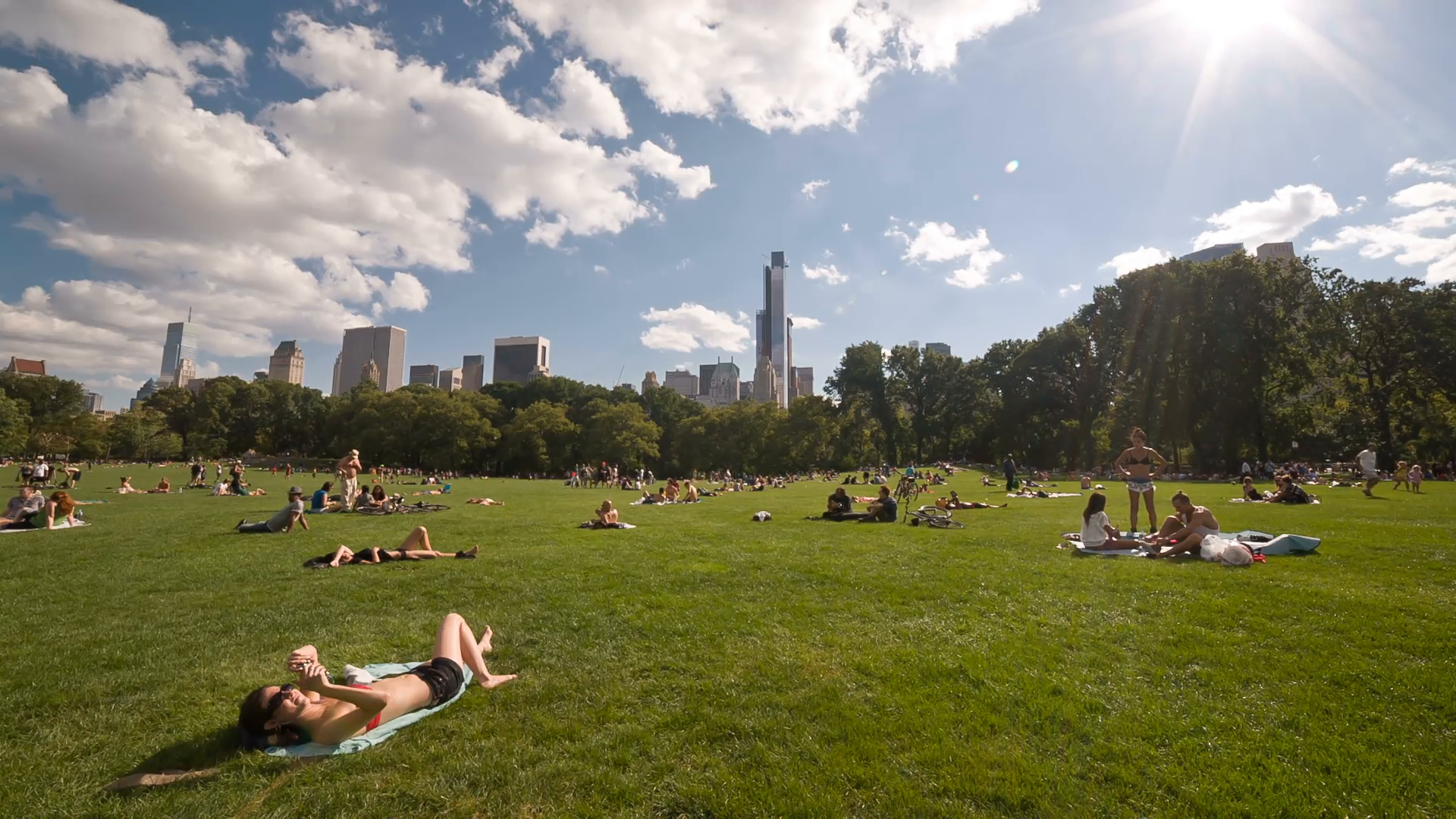 Bright Sun On Hot Sunny Day In Central Park, People Tanning On Towels In Manhattan Nyc Stock Video Footage   Videoblocks - Bright Sunny Day, Transparent background PNG HD thumbnail