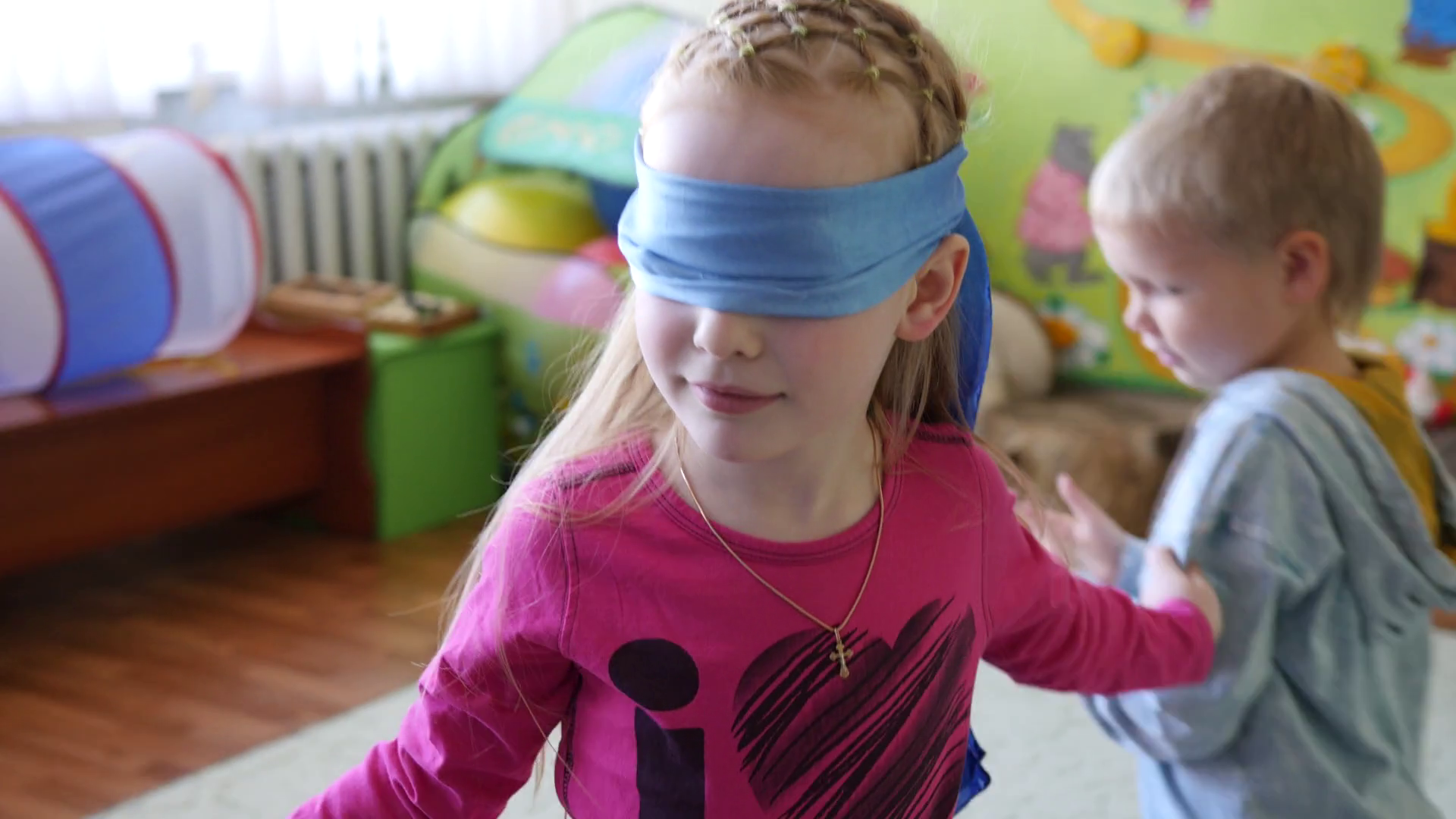 Girl Chasing Kids Play Hide And Seek Blindfolded Funny Game For Children In Playroom Stock Video Footage   Videoblocks - Children Playing Hide And Seek, Transparent background PNG HD thumbnail