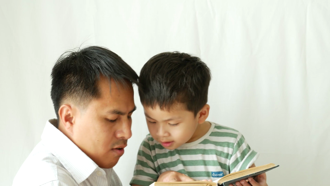 Father And Son Sitting On Bench In The Room Reading And Talking. Stock Video Footage   Videoblocks - Father And Son Talking, Transparent background PNG HD thumbnail