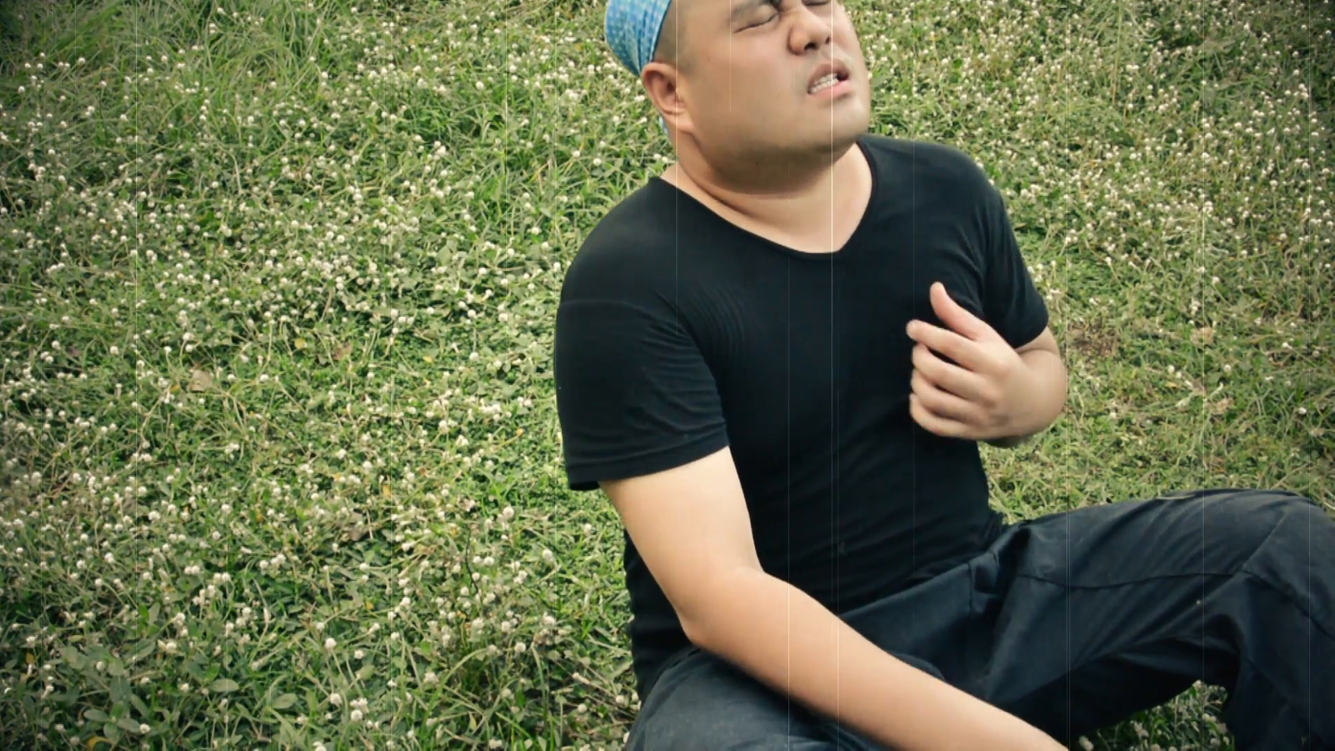 A Fat Asian Man Is Having A Heart Attack Disease And Die On The Grassy Ground Field Alone In Film Grain Scratchy Concept. Stock Video Footage   Videoblocks - Heart Attack, Transparent background PNG HD thumbnail
