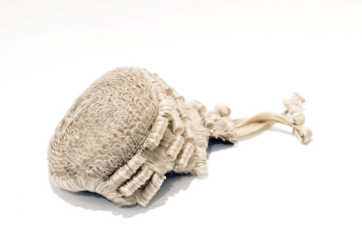 Judge wig on a white backgrou