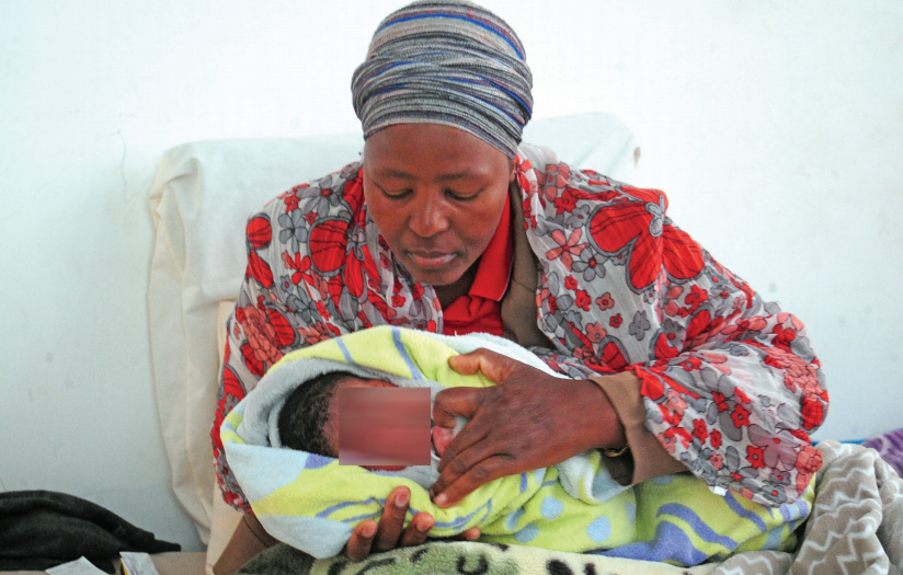 The Mother Of A Young Girl Who Lost Her Life After Giving Birth To A Baby Boy Holds The Infant U2013 The First Time Mother Could Not Get The Medical Attention Hdpng.com  - Mother Giving Birth, Transparent background PNG HD thumbnail
