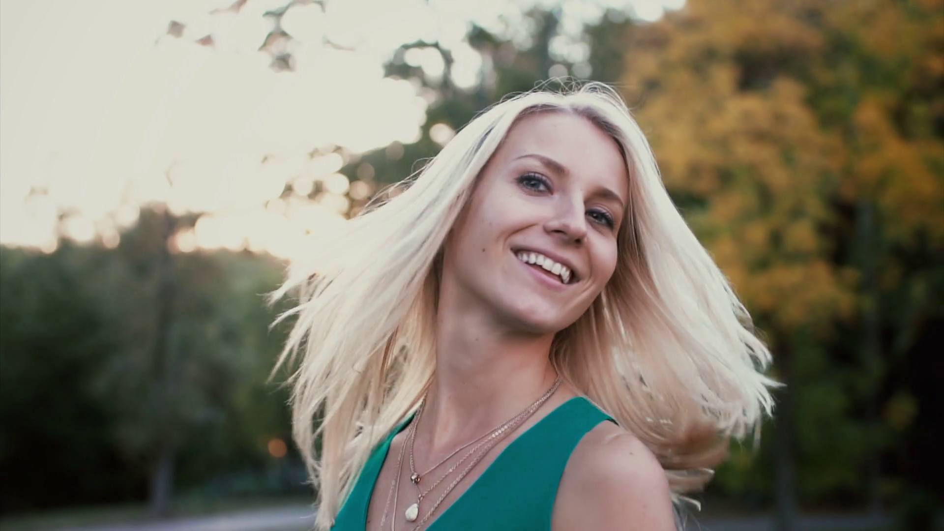 Portrait Of Beautiful Young Woman In Park On Sunset. Blonde Girl Turns And Looks At Camera, Her Hair Waves. Slow Motion. Stock Video Footage   Videoblocks - Of Young Blonde Woman, Transparent background PNG HD thumbnail
