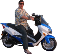 a man riding a motorcycle, Mo