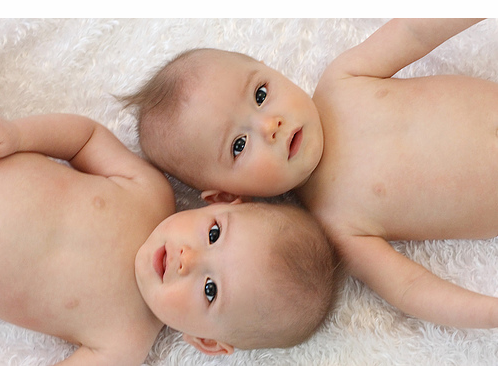 Very cute twin baby girls smi