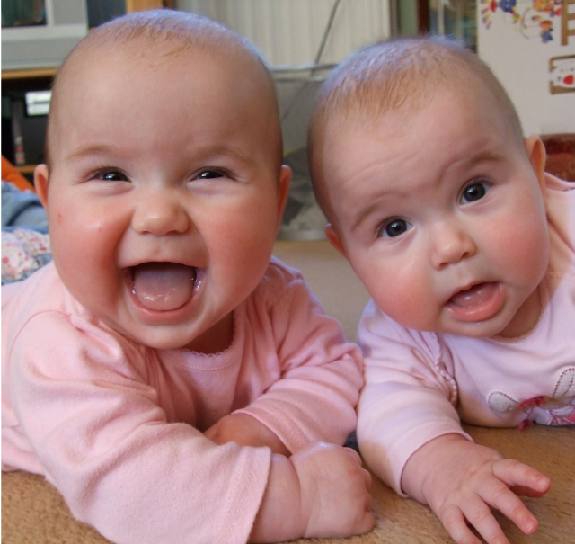 Very Cute Twin Baby Girls Smiling And Looking At The Camera.png - Twin Baby, Transparent background PNG HD thumbnail